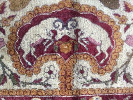 Silk rug of Broadward Hall rams fighting